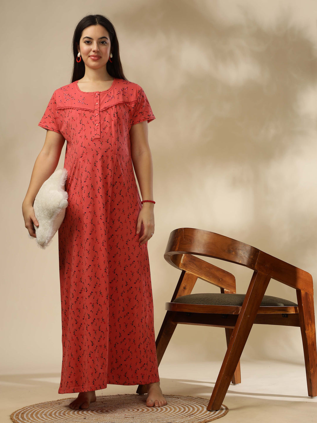 Soft and stylish, our Peachy Pink Maternity Maxi Nightdress awaits